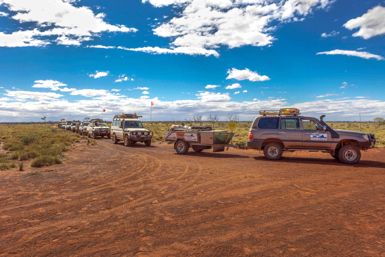 Convoy of 4WDs in a remote location.