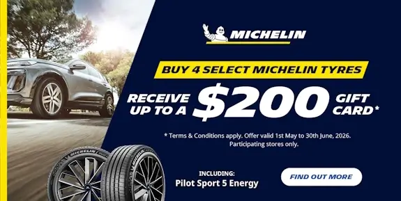 Promotional image for a $200 gift card deal, showing an SUV driving down a road lined with trees.